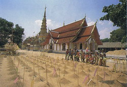 Taking  sand  to  temple  at  Wat  Phrabat  Hoitom, Lamphun  Province