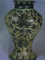 A  vase  with  a  flower  design  from  the  Wiang  Kalong  Kiln.